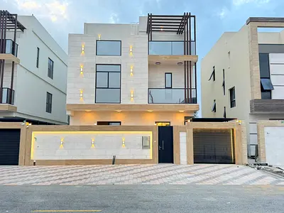 For sale in Al Helio 2, Ajman: two floors and a rooftop terrace + swimming pool, including electricity, water, and air conditioning.