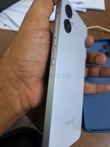 Samsung A06 4g  (white) - Good condition, dual rear cameras Dual Physical Sim.