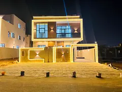For sale in Al-Haliyo 2, a villa with 7 master bedrooms, a majlis, 2 living rooms, two floors, and a
