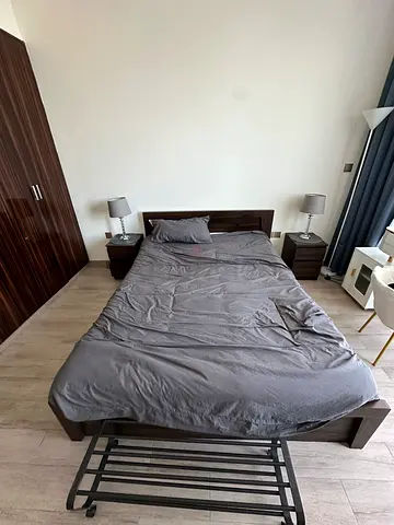 Queen size  wooden bed frame with headboard and two matching bedside tables - Dark wood