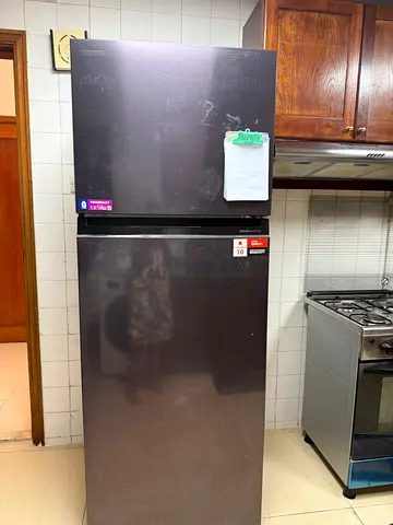 Used double-door refrigerator in good working condition