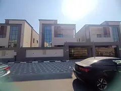 For rent in Al-Haliyo 2, a villa with four master bedrooms, a living room, a majlis, two kitchens, a