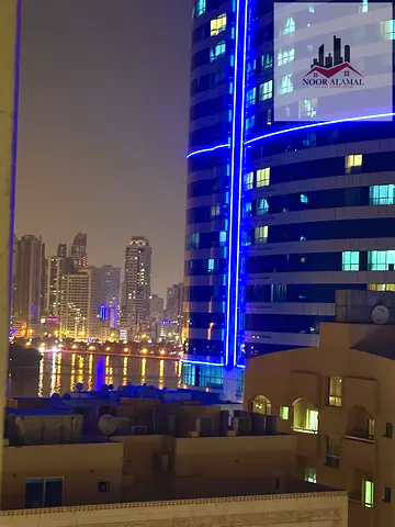 Sharjah, Al Majaz 3, furnished apartment, two bedrooms, living room, kitchen, two bathrooms, and balcony. 5500 AED including internet.