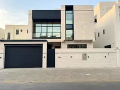 🏡 Modern villa for sale in Al Yasmin, 3 floors, 5 master bedrooms, super deluxe finishing, asphal
