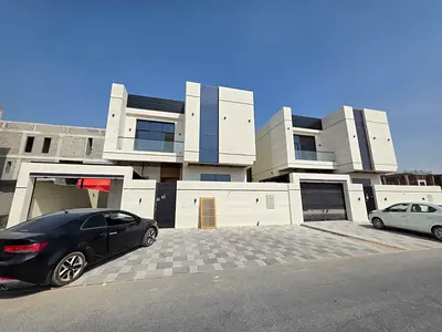 For sale in Al Bahia, a deluxe villa consisting of 5 rooms, a majlis, a living room, a kitchen, a maid's room, and a preparation kitchen.