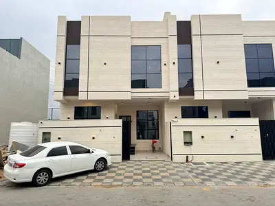 Luxury villa for sale in Al Yasmin, Ajman - 4 master bedrooms, majlis, living room, and roof terrace - central air conditioning - price includes regis