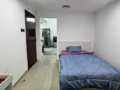 Studio for sale in Al Nahda 1, freehold for Arabs, high floor with balcony, fully renovated, near D