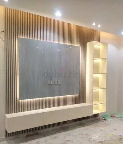Modern Wall-mounted Entertainment Unit with Built-in Shelves and LED Backlight