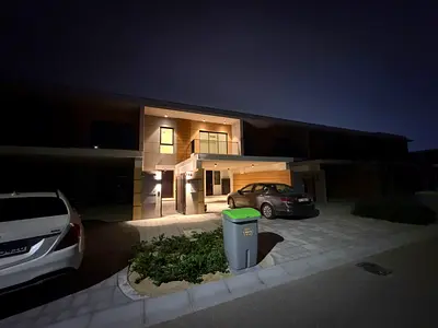 Townhouse in Azha Compound, 4 bedrooms, living room, and majlis. Land area 4000 sq m, built-up area 3200 sq m. Private parking for the villa.