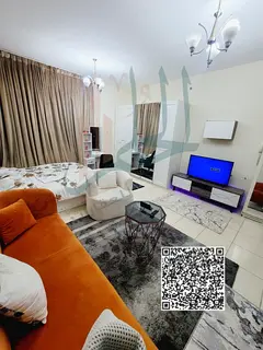For monthly rent: a studio apartment in Al Orient Towers, Al Bustan, featuring a semi-separate kitc