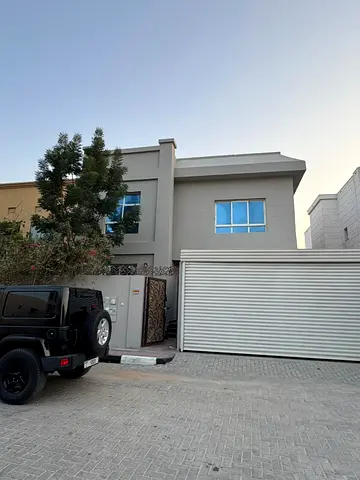 For rent in Al Zameela, Ajman: a villa with 5 master bedrooms, a majlis, a living room, a kitchen, and a maid's room.