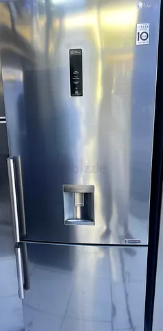 LG Stainless Steel Bottom-Freezer Refrigerator with Water Dispenser (Good Condition)