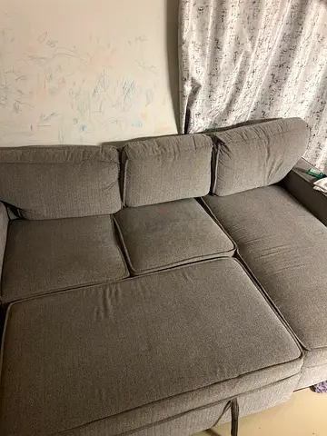 Comfortable 3-seater grey fabric sofa in good condition