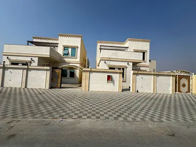 For sale a villa in Al Zahia in Ajman, 4 master bedrooms, a living room, a hall, and a maid's room