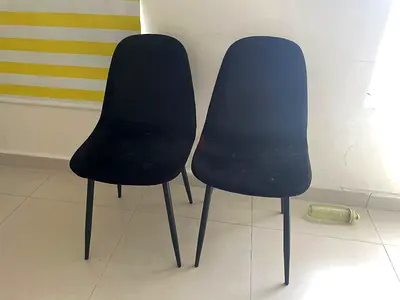 Pair of black dining chairs - simple modern design