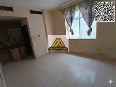 A spacious studio apartment | Separate kitchen | Central air conditioning | Easy access to Dubai and