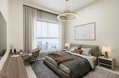 For sale under construction, Oasis Tower 3, delivery late 2027, one bedroom and living room. Asking