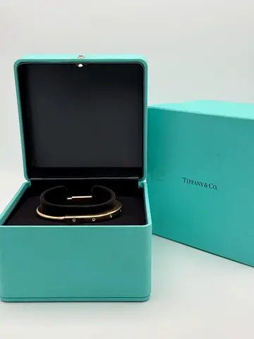 Authentic TIFFANY  CO DIAMOND LOCK BANGLE YELLOW GOLD WITH DIAMOND ACCENTS