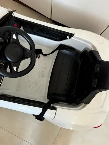 Kids Electric Ride-On Car (Single Seater) — White, battery need to be changed , remote available