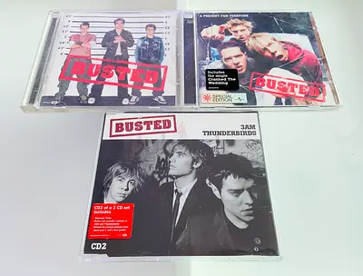 3 Busted Music CD’s