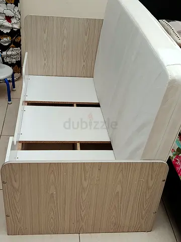Single bed frame with mattress — light wood finish