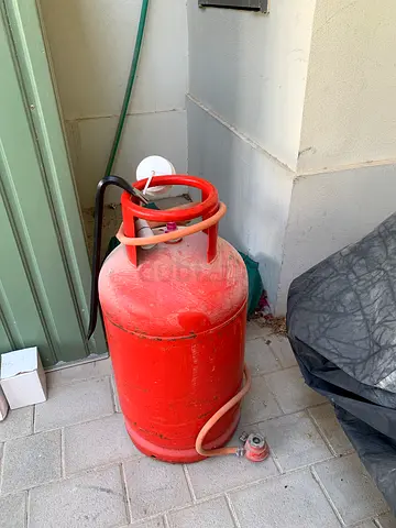 Red LPG Gas Cylinder with Hose and Regulator, big size, sealed as is full.