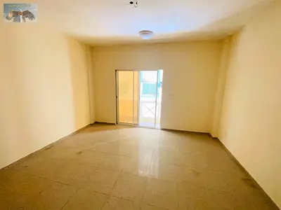 Two-bedroom apartment for annual rent in Ajman, Al Nuaimiya 1, featuring a spacious layout, a suitable view, and a very economical price. The apartmen