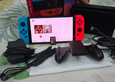 NINTENDO SWITCH OLED +1 GAMES WITH BOX