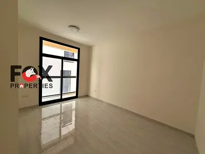 Brand new 1BHK for annual rent in Al Alia on Sheikh Mohammed Bin Zayed Road with 2 bathrooms, balcony and spacious layout.