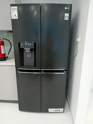 LG Side-by-Side Refrigerator with Water  Ice Dispenser - Black, Good Condition