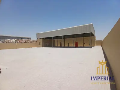 🏭 حوطة مع مستودع للإيجار في أم الثعوب أم القيوين | مساحة 15,000 قدم | كهرباء 100 كيلو | موقع صناعي مميز جاهز للتشغيل