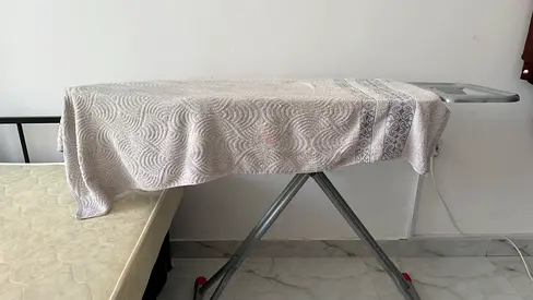 Used foldable ironing board in good condition