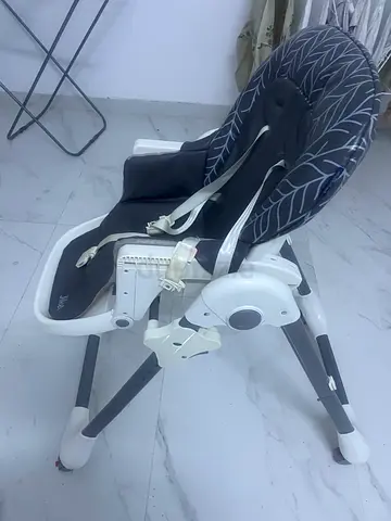 Used adjustable baby high chair - clean and functional