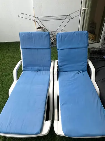 Pair of Outdoor Sun Loungers with Blue Cushions