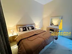 For monthly rent: Luxurious two-bedroom apartment with a living room, furnished with high-end and we