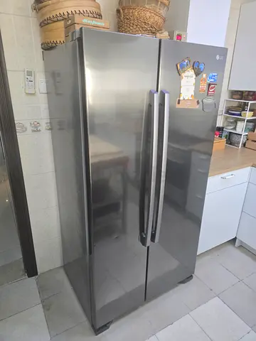 Large Stainless Steel Side-by-Side Refrigerator - Good Condition