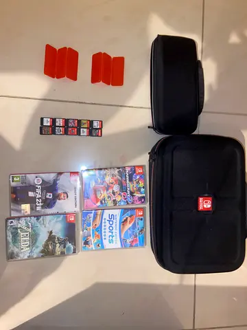 Nintendo Switch games bundle with carrying cases (FIFA 23, Zelda, Mario Kart, Sports…)