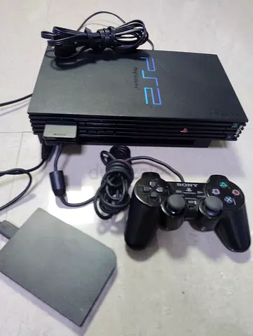 Playstation 2 Fat with 140 games