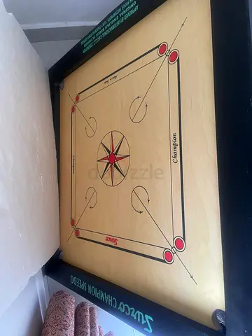 Champion carrom board