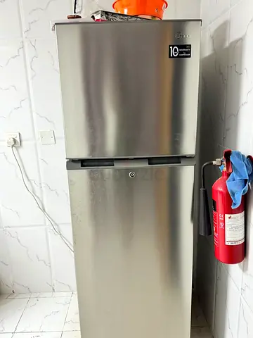 LG Silver Double-Door Refrigerator - Good Condition, 10-Year Warranty Sticker