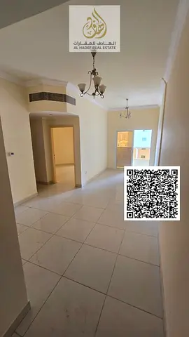 Two-bedroom apartment with a living room in Al Nuaimiya 1, featuring two bathrooms, a balcony, buil