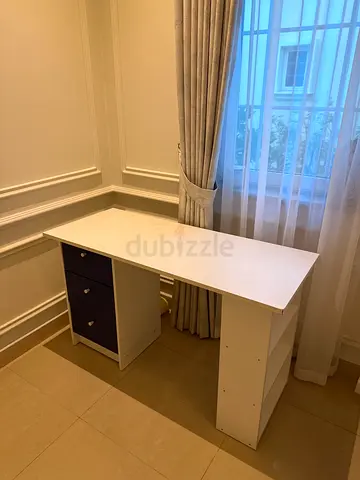 Modern White Study Desk with Blue Drawers and Side Shelves