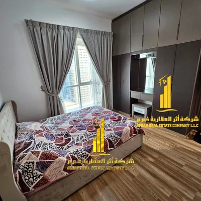 غرفتين وصالة مفروشة بالكامل بأثاث جديد، مطبخ مجهز بالكامل للايجار الشهرى  بعجمان - الراشدية - ابراج واحة