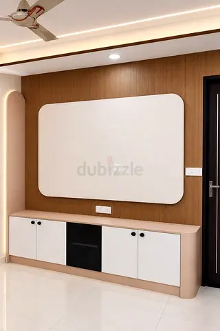 Modern low-profile TV cabinet with wood panel backdrop