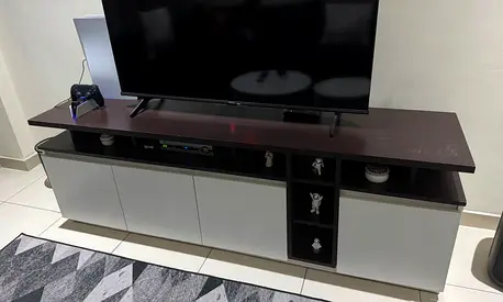 Modern low TV entertainment unit with storage