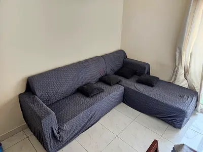 Used L-shaped 3-seater fabric sofa with chaise - dark grey slipcover