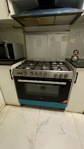 6-Burner Gas Cooker with Oven - Used, Good Working Condition