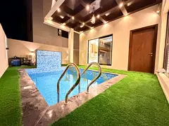 Two-story villa with a rooftop terrace and swimming pool, conveniently located near amenities, at an