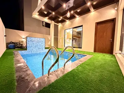 Two-story villa with a rooftop terrace and swimming pool, conveniently located near amenities, at an exclusive, negotiable price.