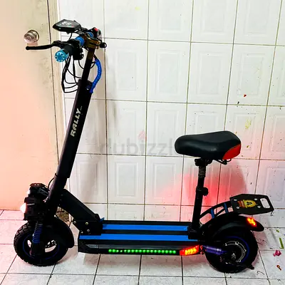 Rally electric scooter with seat, dual suspension and LED lights